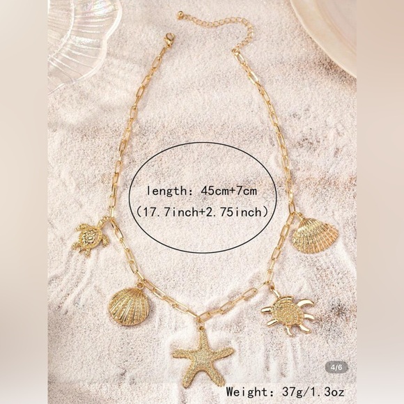 NWT Gorgeous Gold Sea Life Necklace with Shell Starfish, Seashell & Turtle Charm - Picture 4 of 6